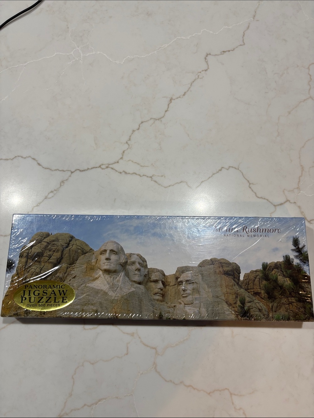 Mount Rushmore Panoramic Jigsaw Puzzle - Scenic Blue & Tan Box